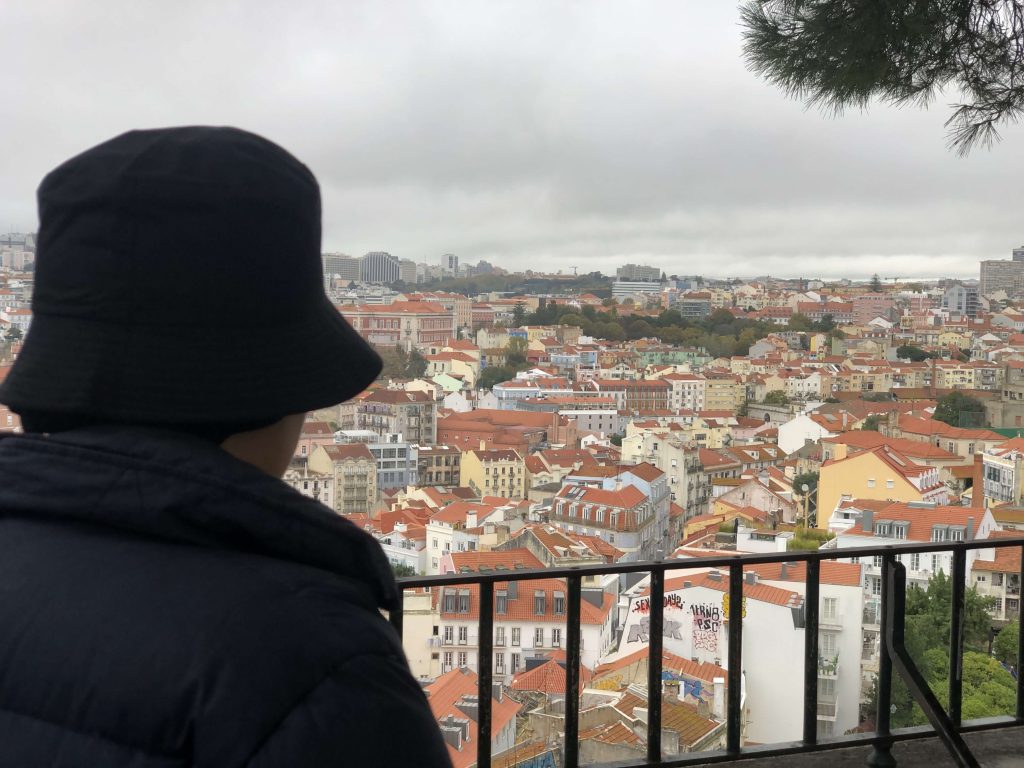 I wore a bucket hat in Lisbon, Portugal even when the weather was cold!